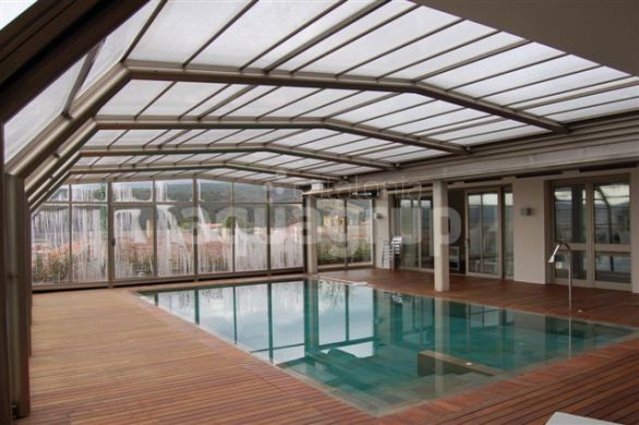 Foto cerramientos adosados para piscinas grandes