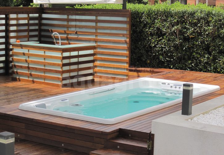 Picture: Installation of outdoor swimspa embedded in wooden floor