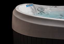 Sleek design with raised spa rim